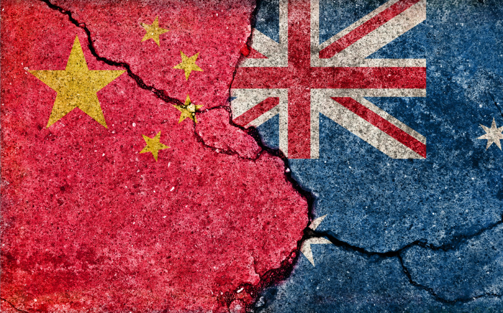 Grunge country flag illustration (cracked concrete background) / China vs Australia (Political or economic conflict)