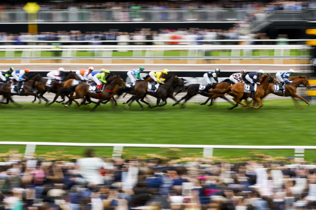 A slow shutter image of riders competing in race seven the Lexus Melbourne Cup during the 2022 Lexus Melbourne Cup at Flemington Racecourse in Melbourne, Tuesday, November 1, 2022. (AAP Image/Con Chronis) NO ARCHIVING, EDITORIAL USE ONLY