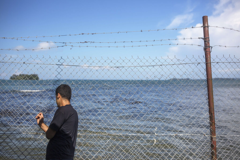 MANUS, LORENGAU, PAPUA NEW GUINEA - 2018/02/07: Kurdish Karam Zahirian left everything when he fled Iran. He was hoping to find sanctuary in Australia. But in stead he was sent to Australia  offshore detention center  at Manus island.

The human cost of Australias offshore detention policy has been high for those unfortunate enough to have been caught in its net. For asylum seekers trapped on the remote island of Manus in Papua New Guinea, the future remains as uncertain as ever. Australias offshore detention center there was destroyed in 31 October 2017 but for the 600 or so migrants who remain on the remote Pacific island, little has changed. The asylum seekers live with the torment of separation from family and friends and in the shadow of depression and the traumas of their past. (Photo by Jonas Gratzer/LightRocket via Getty Images)