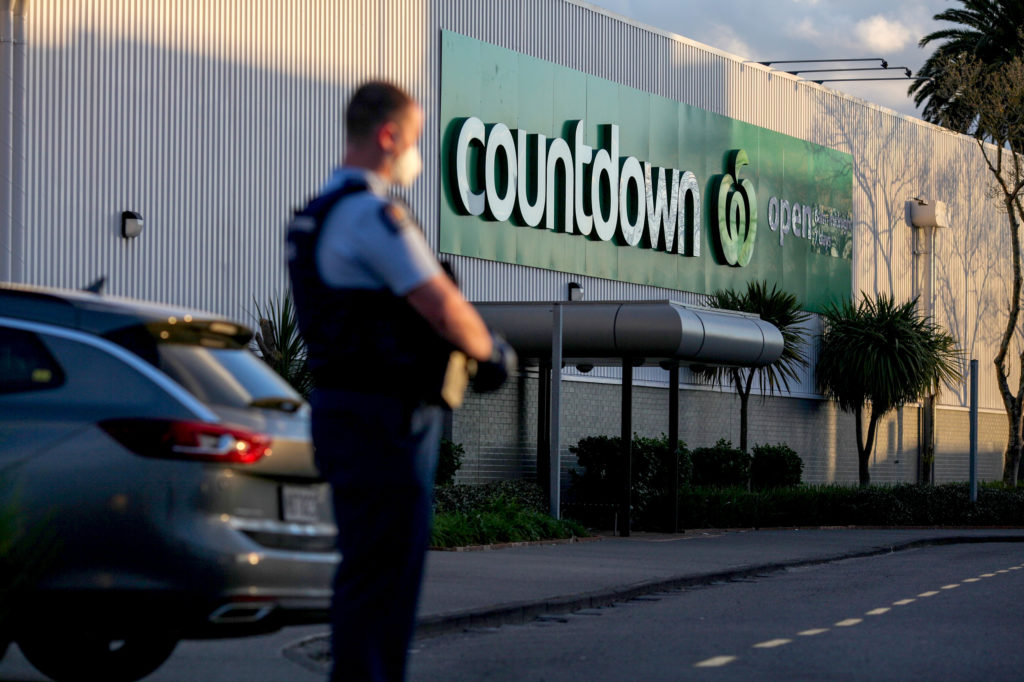 A police officer stands guard near the New Lynn supermarket in Auckland, New Zealand, Sept. 3, 2021. New Zealand Prime Minister Jacinda Ardern confirmed that the violent attack that happened at New Lynn supermarket in Auckland at 2:40 p.m. local time Friday was a "terrorist attack" carried out by an "extremist." (Photo by Zhao Gang/Xinhua via Getty Images)