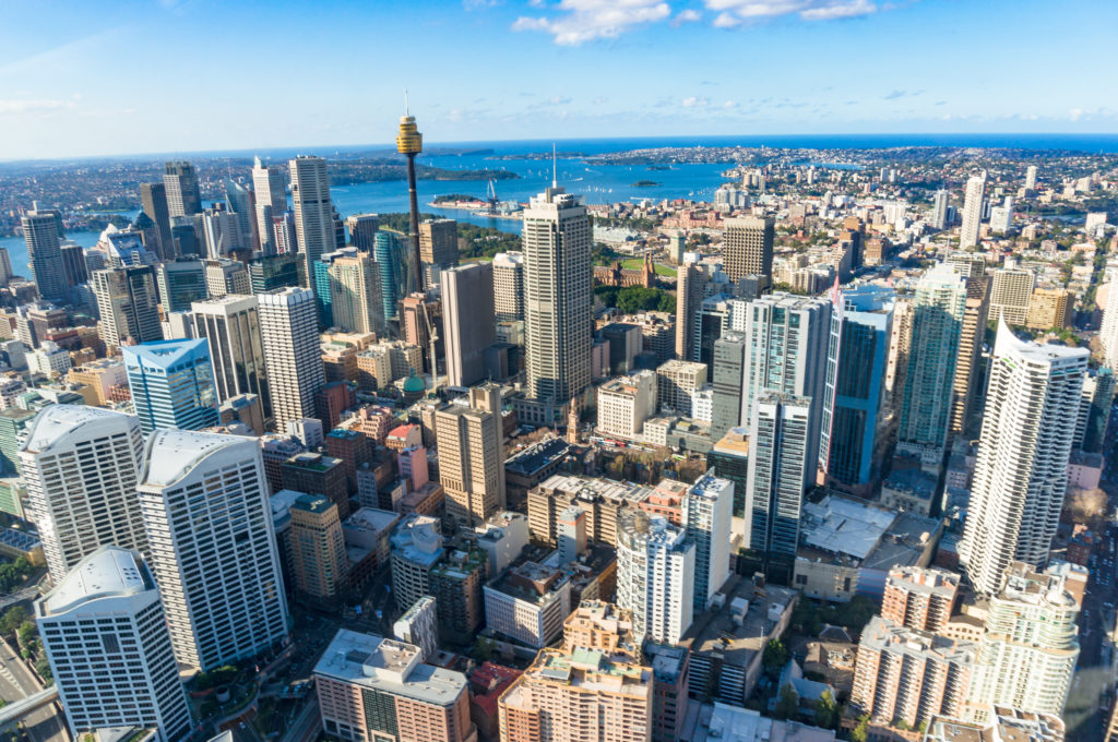 Aerial view of Sydney Central Business District with skyscrapers on sunny day. Urban background