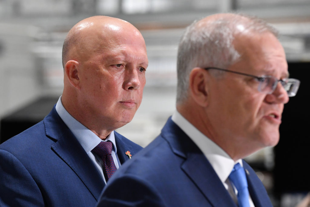 Minister for Defence Peter Dutton and Prime Minister Scott Morrison at a press conference after visiting TAE Aerospace on Day 12 of the 2022 federal election campaign, near Ipswich, east of Brisbane, in the seat of Blair. Friday, April 22, 2022. (AAP Image/Mick Tsikas) NO ARCHIVING