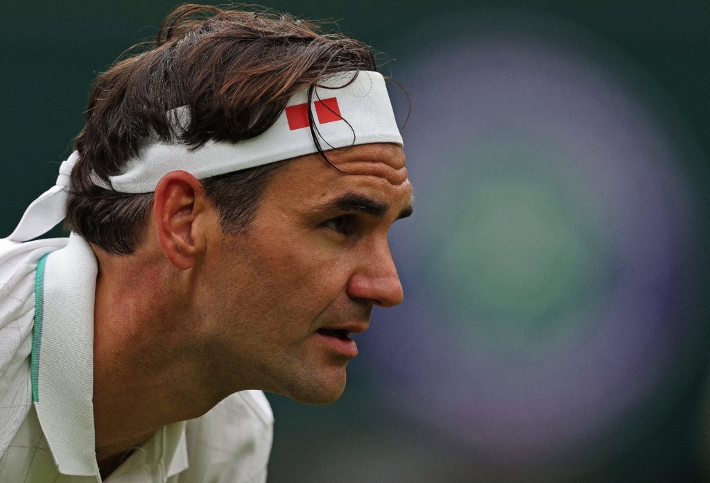 Switzerland's Roger Federer plays against France's Adrian Mannarino during their men's singles first round match on the second day of the 2021 Wimbledon Championships at The All England Tennis Club in Wimbledon, southwest London, on June 29, 2021. - - RESTRICTED TO EDITORIAL USE (Photo by Adrian DENNIS / AFP) / RESTRICTED TO EDITORIAL USE (Photo by ADRIAN DENNIS/AFP via Getty Images)