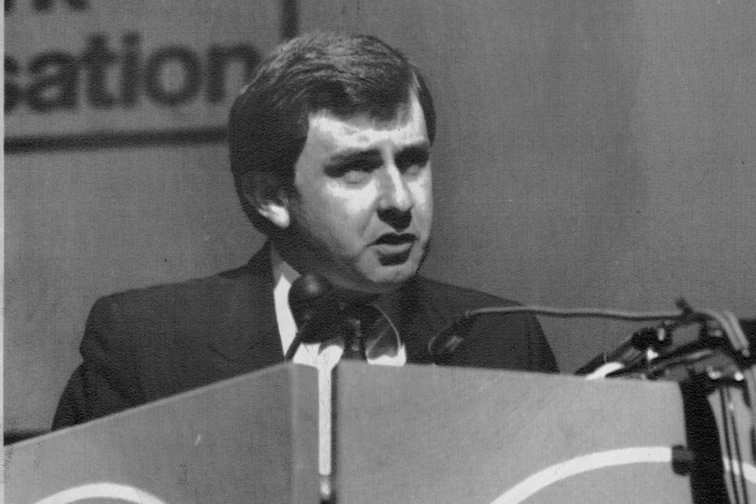 A black and white image of a young Simon Crean delivering a speech